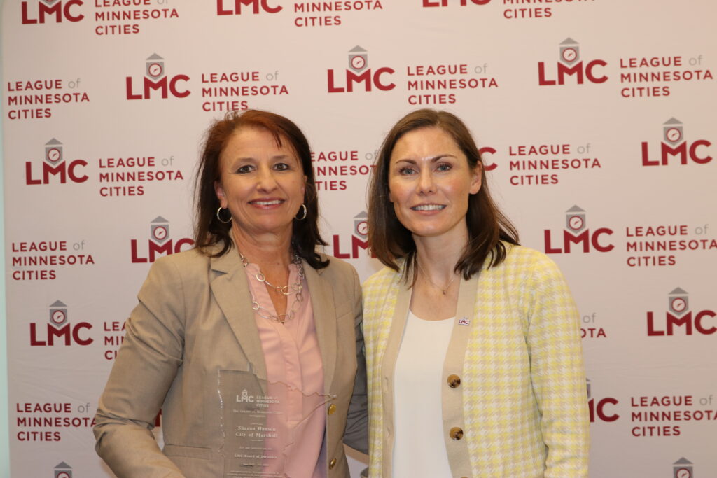 Former LMC Board of Directors member Sharon Hanson and President Jenny Max are shown.
