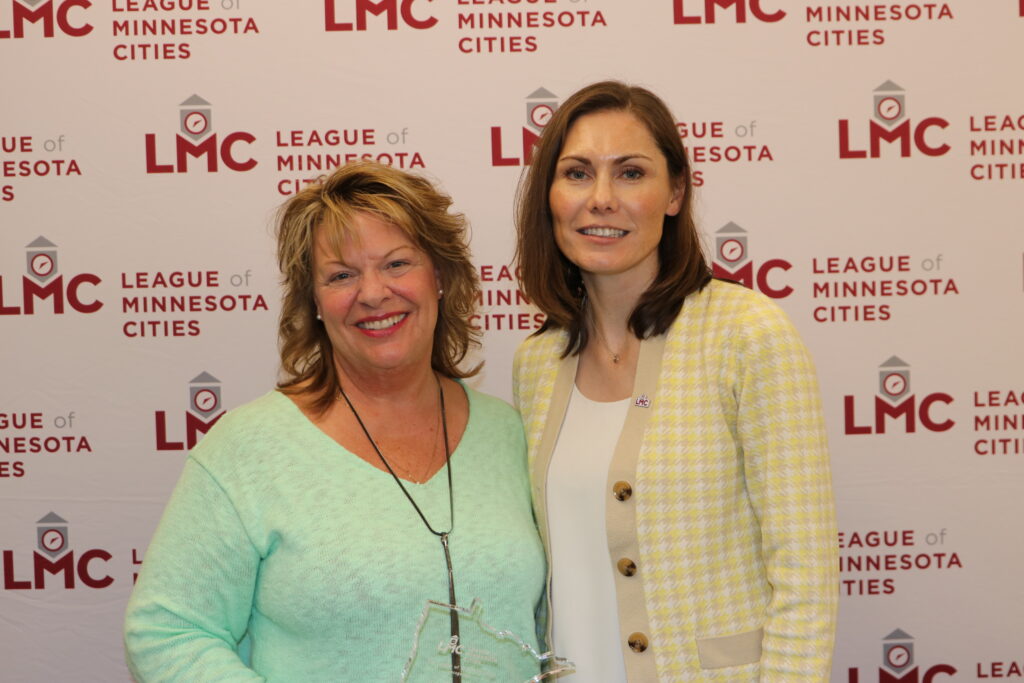 Former LMC Board of Directors member Christina Volkers and President Jenny Max are shown.
