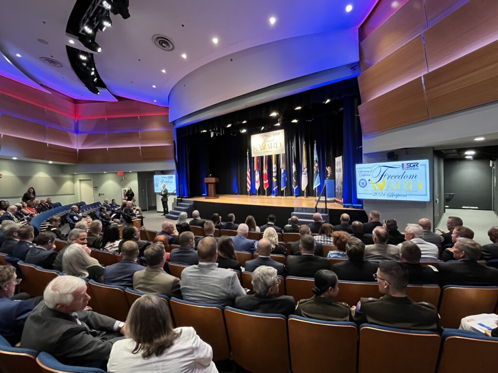 a large crowd awaits the ESGR award presentation.