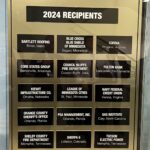 A plaque lists all recipients of the ESGR Freedom Award in 2024