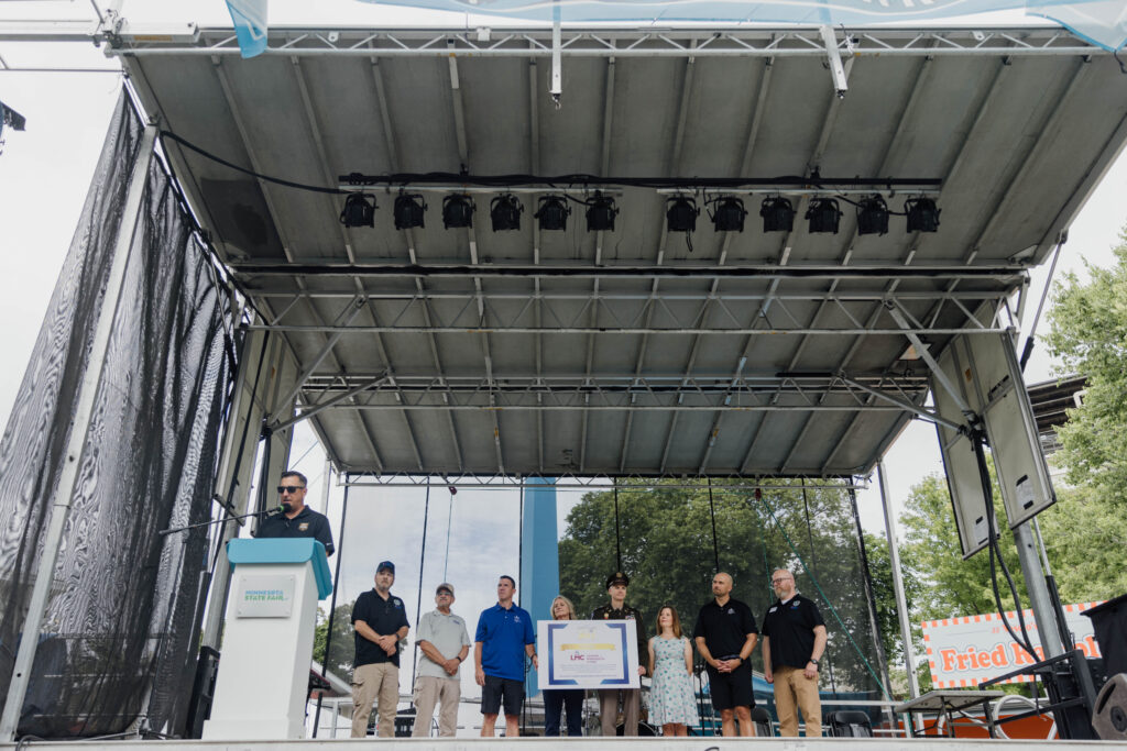 League of Minnesota Cities on stage at the Minnesota State fair.