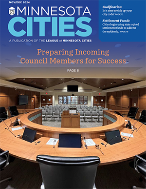 Minnesota Cities Magazine November, December 2024 cover. The cover image is of the City of Woodbury's council chambers.