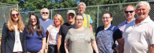 A group of people in a community garden.